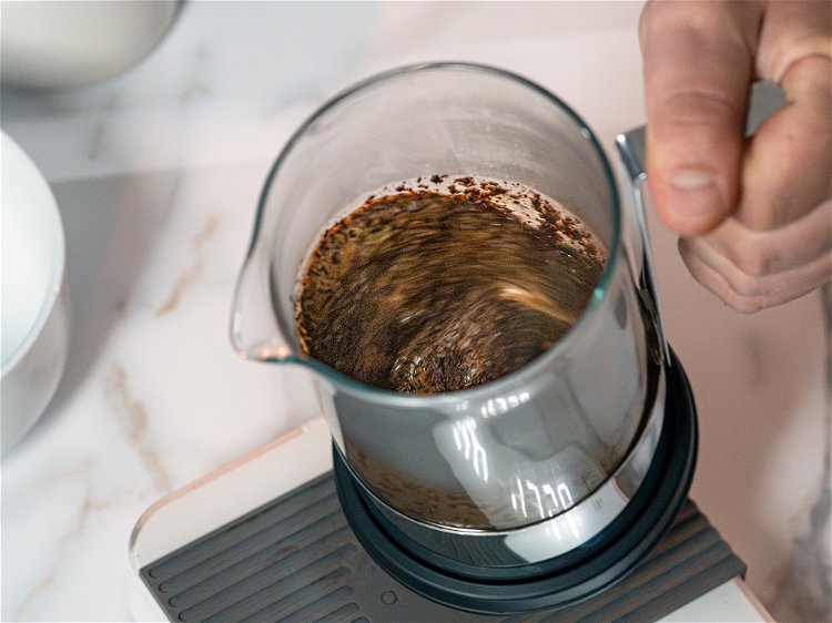 Image of Pick up and swirl French Press fairly aggressively to ensure...