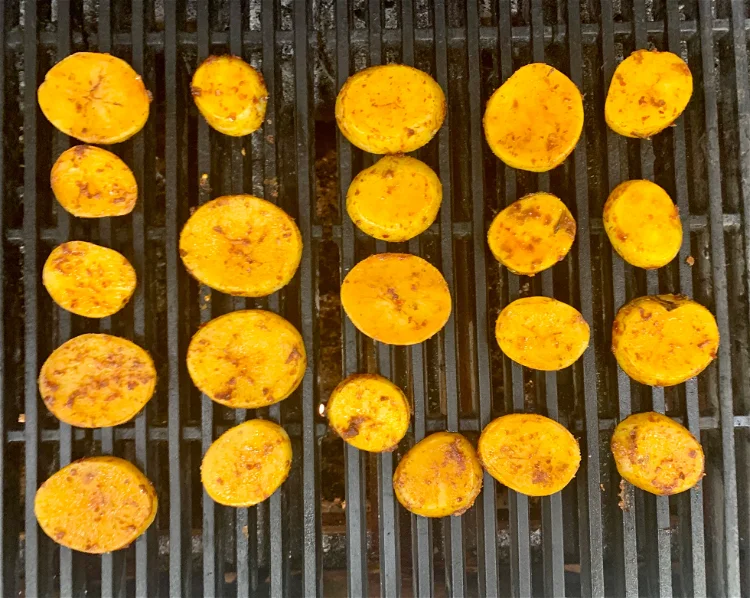 Image of On a medium-high heat grill, add cooked potatoes and grill,...
