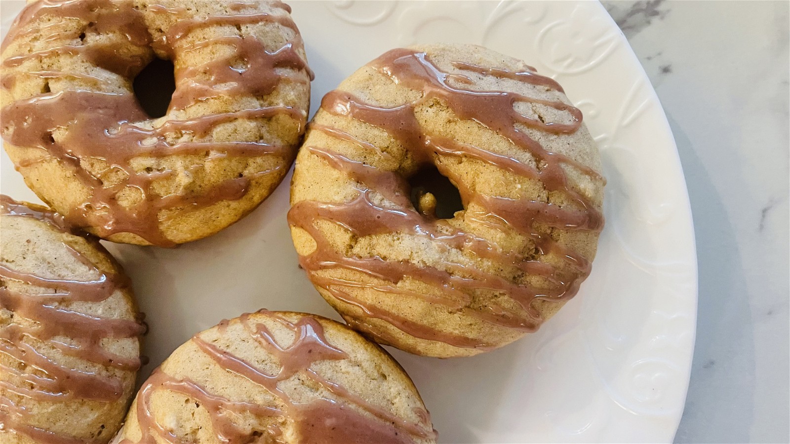 Image of Cinnamon Donuts With Elderberry Icing