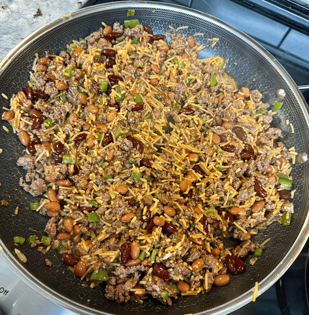 Image of While green sauce is boiling and the red sauce is...