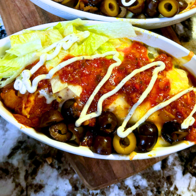 Image of Serve with lettuce, olives, salsa, sour cream, and any other favorite toppings. Enjoy!