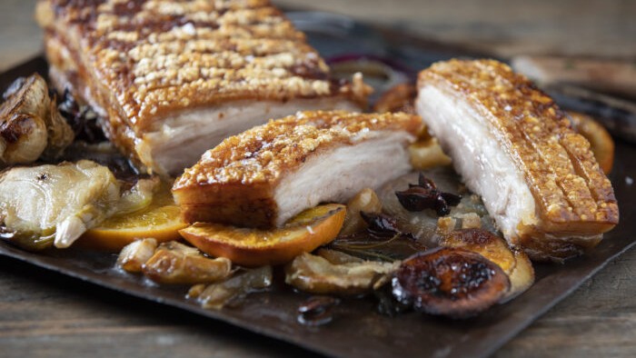 Image of Roast pork belly with orange, apple, sage & garlic