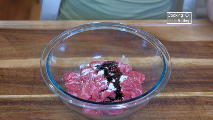 Image of Season the beef with 1/4 tsp of ground white pepper, 1/3 tsp of baking soda, 1.5 tsp of dark soy sauce, and a big drizzle of oil. Mix until well combined. Set the meat aside for 15 minutes. Here is...