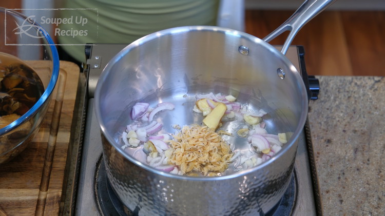 Image of Heat a saucepan and add oil. Toss in some minced garlic, ginger, shallot slices, and 1.5 tbsp of sun dry baby shrimp. It has a strong umami taste and goes well with the mushrooms. However, I understand it is hard...