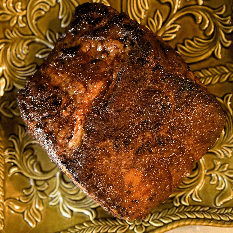 Image of Heat a cast iron skillet to high heat, melt the butter or tallow and sear each side of the cooked prime rib for about one minute. Allow the prime rib to rest off of the heat for about 10 minutes.