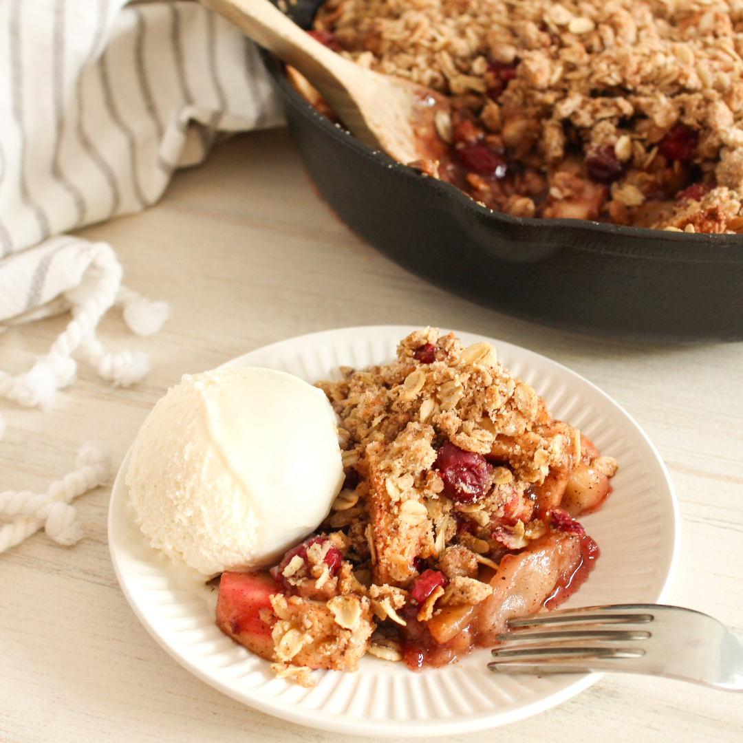 Image of Apple, Cranberry & Granolove Maple Spice Crumble in a skillet
