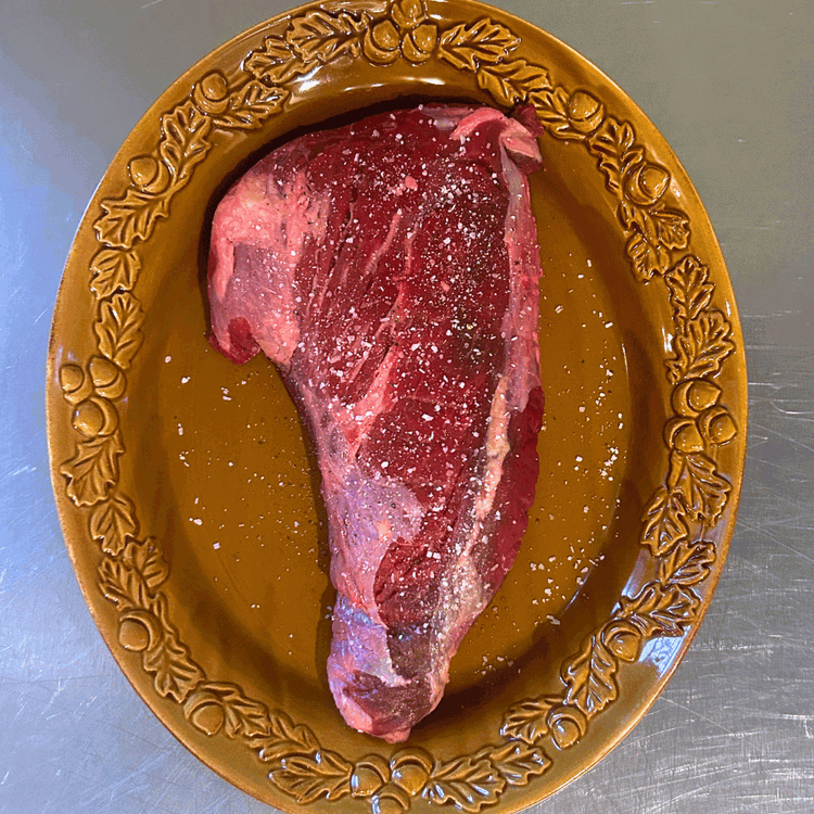 Image of Rub the trimmed tri tip with steak seasoning until it's fully coated. Allow the roast to rest for approx. 30 more minutes 