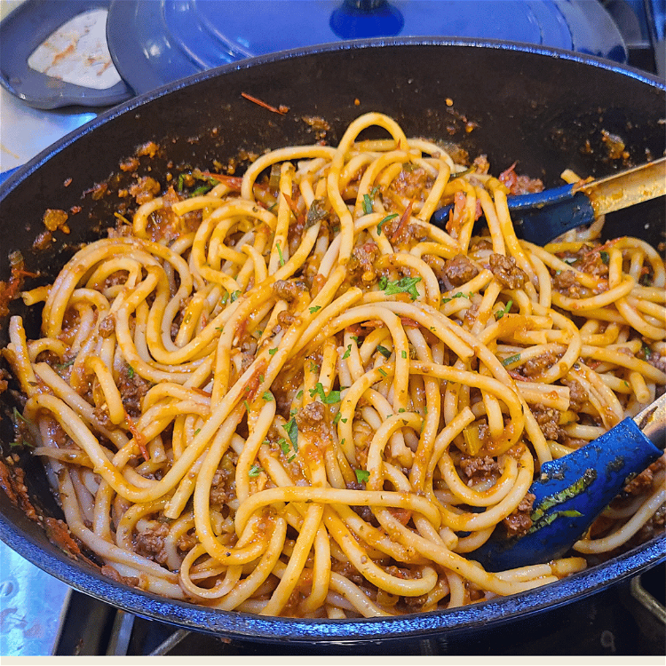 Image of Toss the pasta in the sauce and ensure its well...