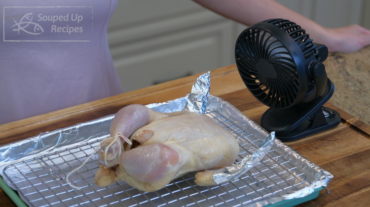 Image of Optionally, quickly dry the chicken skin with a small fan while waiting for the oven to preheat. If you don’t have it, just put it under a ceiling fan for 10-20 minutes and it will do the same job. This...