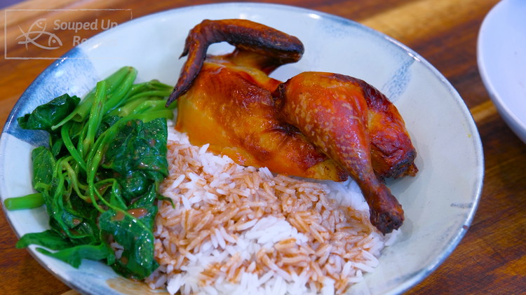 Image of Serve the roasted cornish hen with white rice and blanched vegetables.