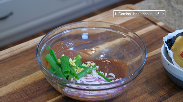 Image of Combine the fermented bean curd, the bean curd juice, soy sauce, oyster sauce, hoisin sauce,  five spice powder, ground white pepper, shallot slices, minced garlic, and ginger in a big mixing bowl. 