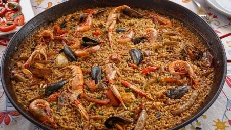 Image of Fiery Chilli Oil Paella Rice with Paprika and San Marzano Tomatoes
