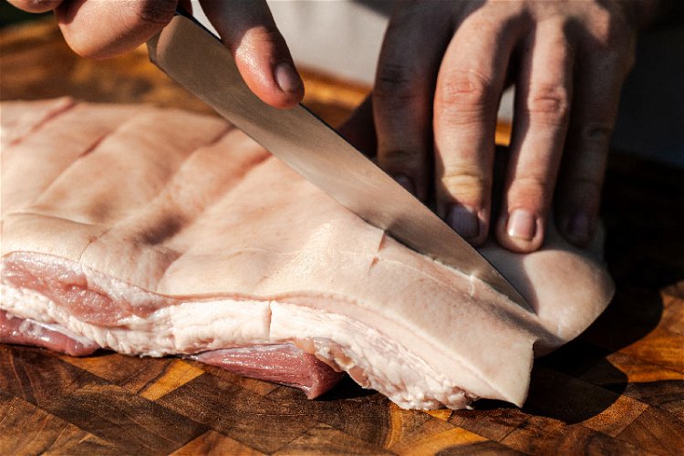 Image of Lay out pork belly and with a sharp knife, lightly...