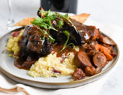 Image of Red Wine Braised Short Ribs with Baby Carrots and Baby Dutch Yellow® Potatoes