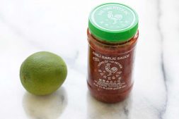 Image of Preheat the oven to 400°F (207°C). In a small bowl, mix the garlic, Chili Garlic Sauce, lime juice, honey and salt together. Stir to mix well.