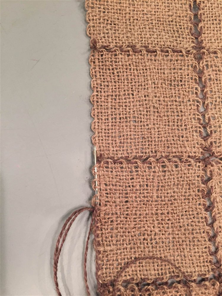 Image of Reinforce the runner edges: thread a double strand of yarn...