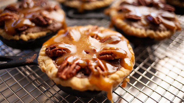 Image of Neatly arrange the toasted pecan halves on top of the...