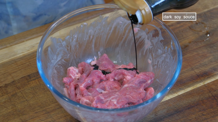 Image of Once all the starch water is absorbed, I like to add a little bit of dark soy sauce to give the beef a desired brown color. Set it aside.