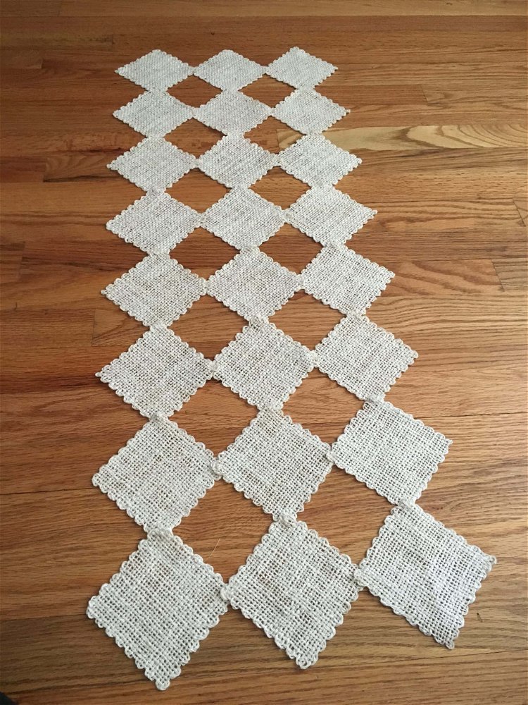 Image of After you have woven the squares, finish each square by...