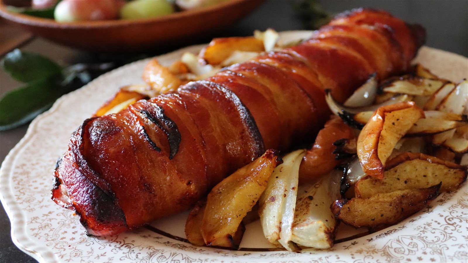 Image of Bacon Wrapped Pork Loin with Roasted Apples
