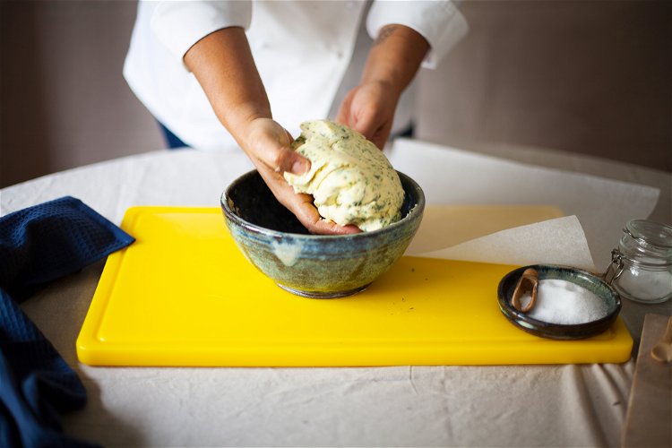 Image of Mix the butter, herbs, chopped garlic, and salt until well...