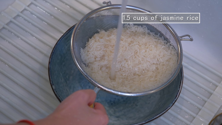 Image of Wash the rice several times and drain it thoroughly. I am using jasmine rice. Sushi rice and glutinous rice will also work. Avoid using basmati and brown rice because their grains don't stick together after cooking. 