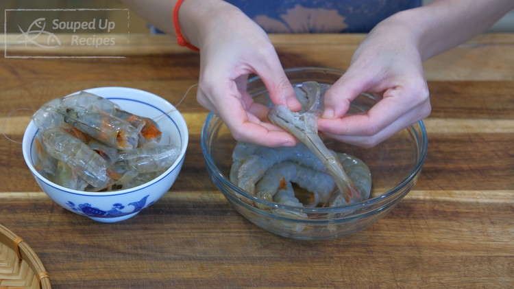 Image of To prepare the shrimp, tear the head off, use a pair of scissors to cut the back open, peel the shell, and remove the vein. I know it is a lot easier to buy pre-peeled shrimps but we need to...