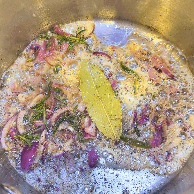 Image of Pour 1 to 2 tablespoons of olive oil into a medium pot or saucepan and heat for about 1 minute or until the olive oil looks hot and glassy. Immediately add herbs,  onion and garlic; cook over medium-high to high...