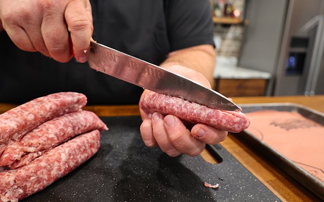Image of Split each bratwurst sausage and remove the meat from the...