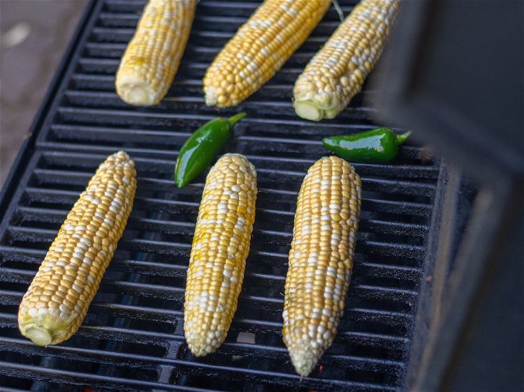 Image of When the grill is hot add your corn and jalapeño...
