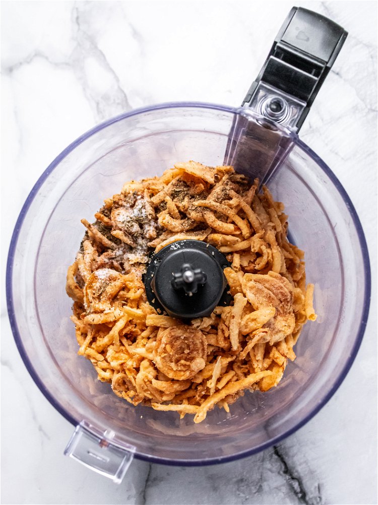 Image of Combine French fried onions, thyme, black pepper, and salt in...