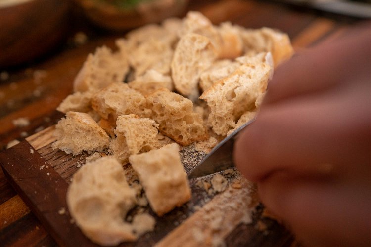 Image of Tear bread into bite-sized pieces and bake 250 degrees F...