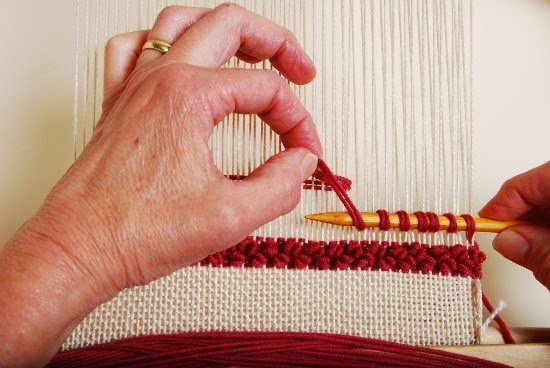 Image of Using a knitting knitting needle or your fingers and working...