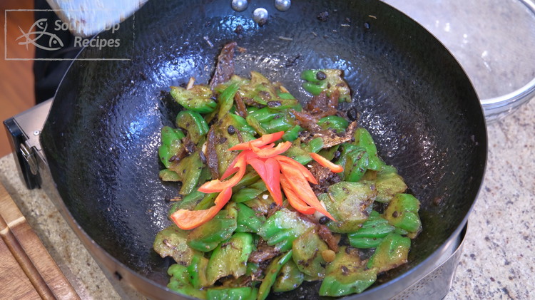 Image of Before serving, add red chili and mix well. Serve with white rice.