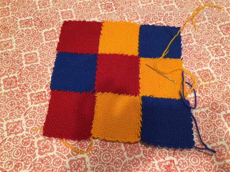 Image of When all squares are sewn together, use a loose end...