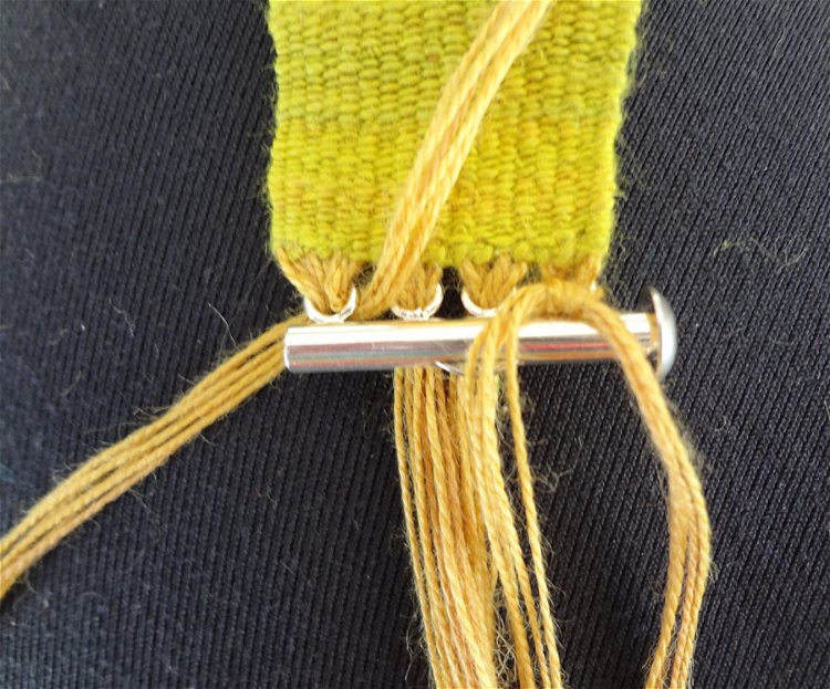 Image of Tie onto the clasp and trim.
