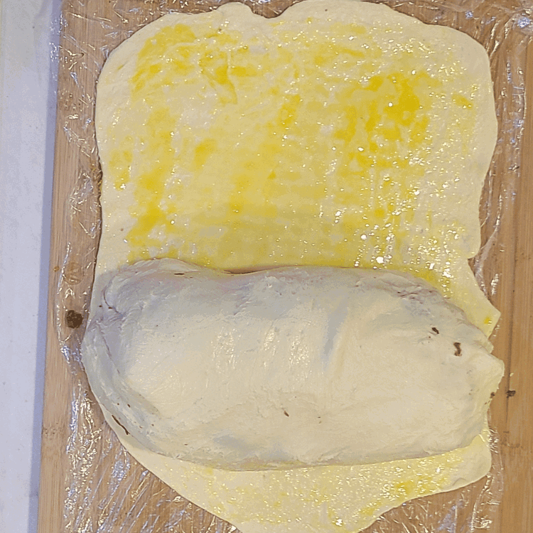 Image of Heat oven to 425°. Lightly flour your work surface, then spread out puff pastry and roll it into a rectangle that will cover the tenderloin roll you just made. Brush the the pastry with egg wash, Remove the tenderloin from...