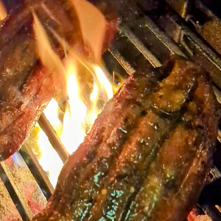 Image of Spray all sides of the turkey with olive oil or duck fat and sear them directly over the flame for 30 seconds a side.