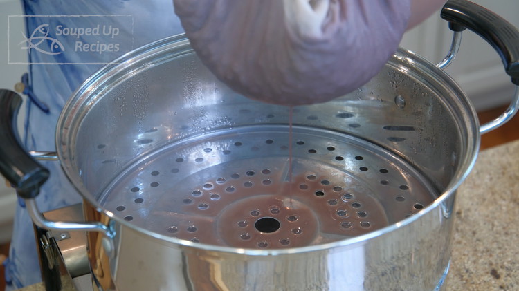 Image of Once done, take the black beans out. Make sure to tab a few times so you let the excess water drain.