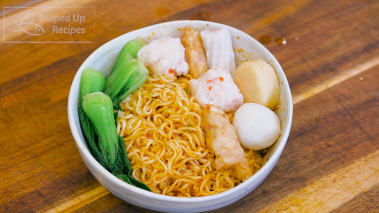 Image of Mix the noodles with the sauce. Top with the bok choy and meatballs.