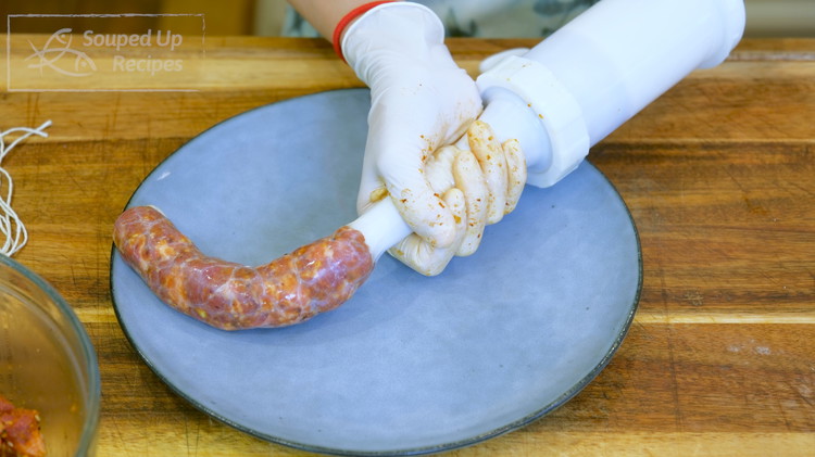 Image of Once done, check the surface of each sausage. If you see any air bubbles, poke it with a toothpick.