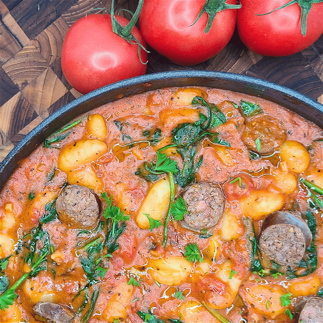 Bison sausage in pan with gnochhi
