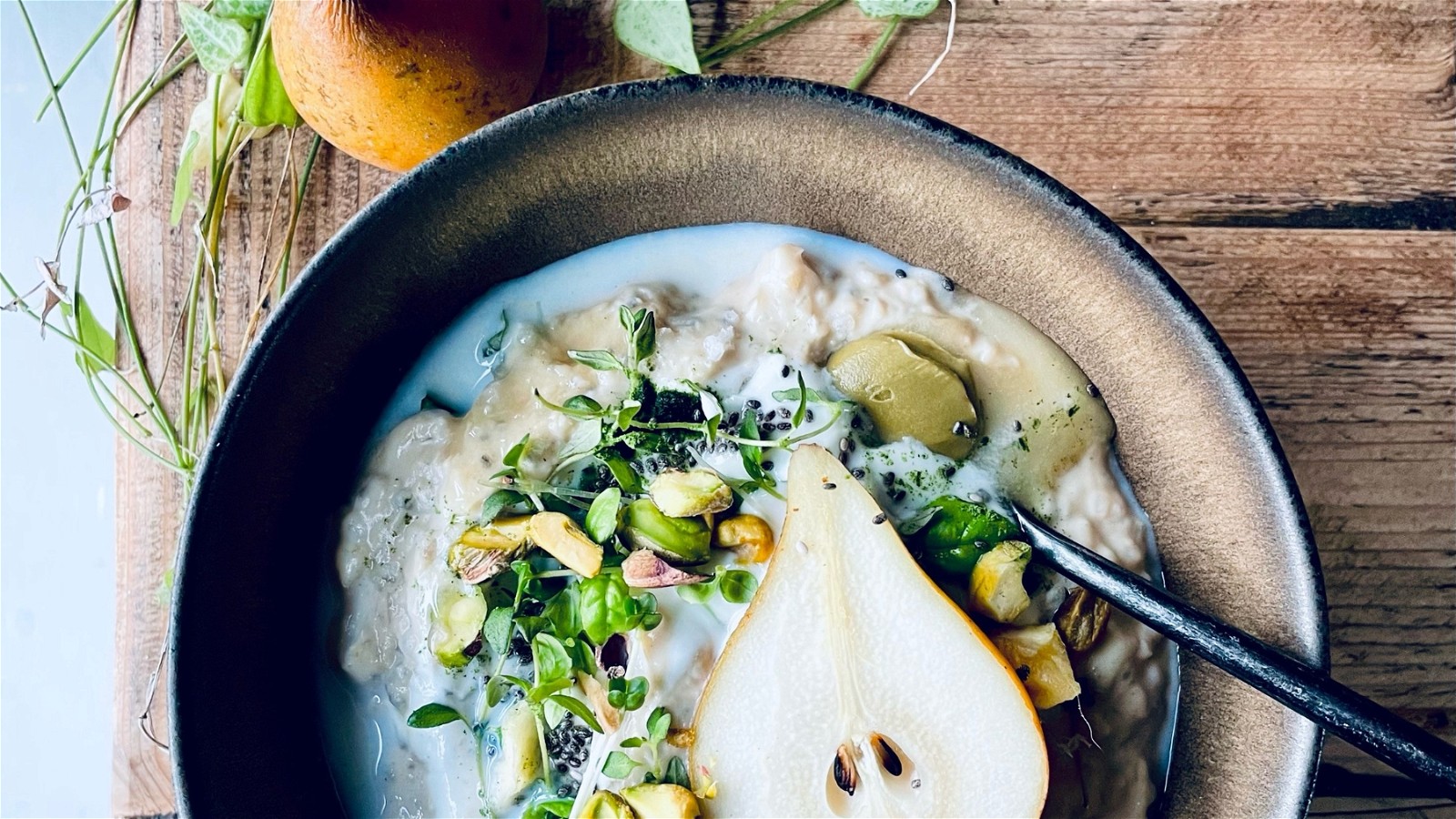 Image of Poached Pear With Honey & Pistachio Porridge