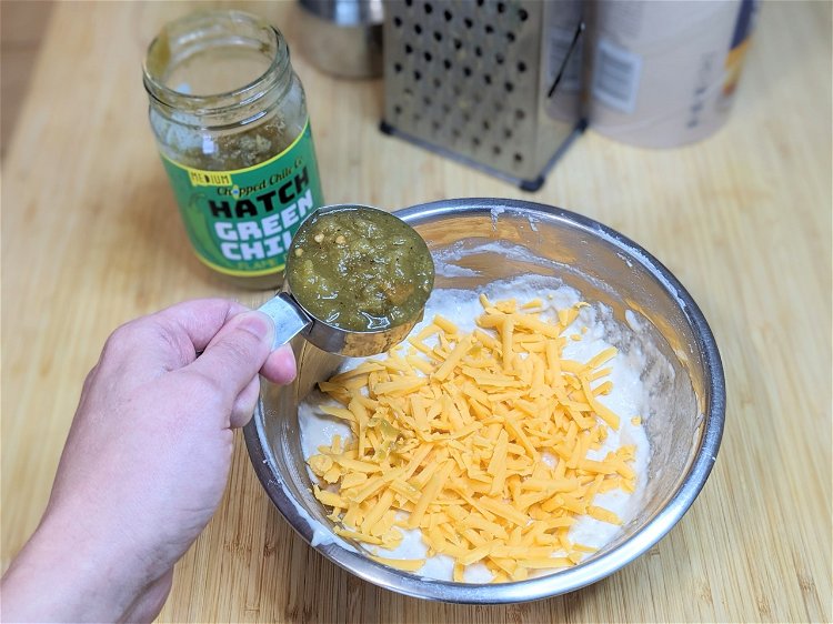 Image of Fold in the shredded cheese and Chopped Chile Co. Green...