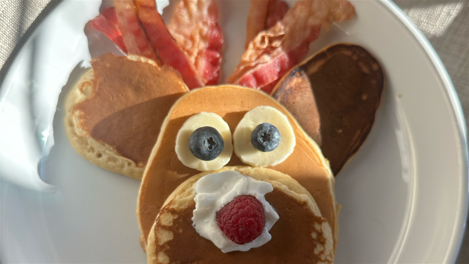 Image of Festive Cheer for Breakfast: Cute and Delicious Reindeer Pancakes