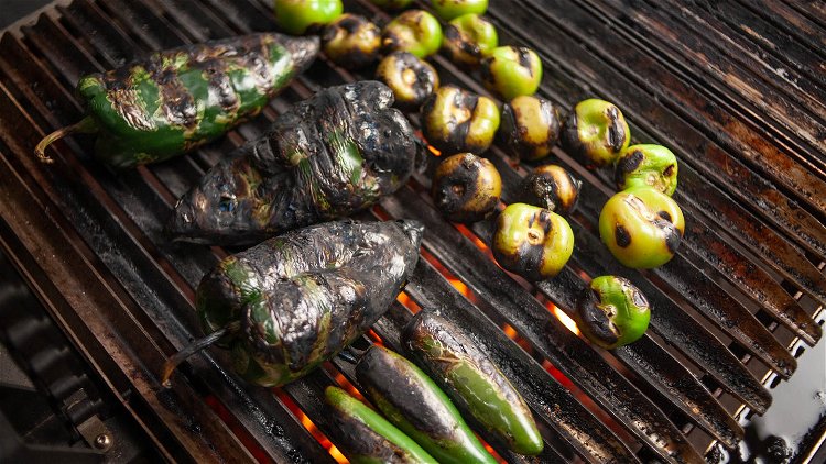 Image of To make the fire roasted salsa verde, first grill the...