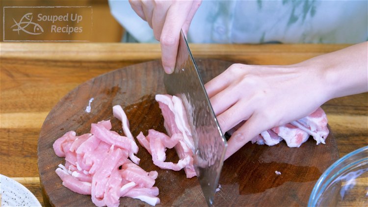 Image of Cut the pork into 1/8-inch thick slabs and thinly julienne...