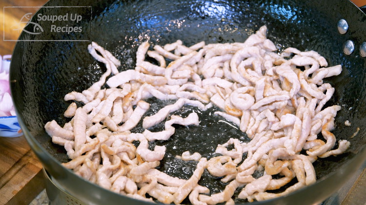 Image of Add the pork and stir over high heat for 2 minutes or until the pork is changed color.