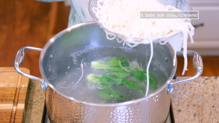 Image of Add some baby bok choy and blanch for 15 seconds.