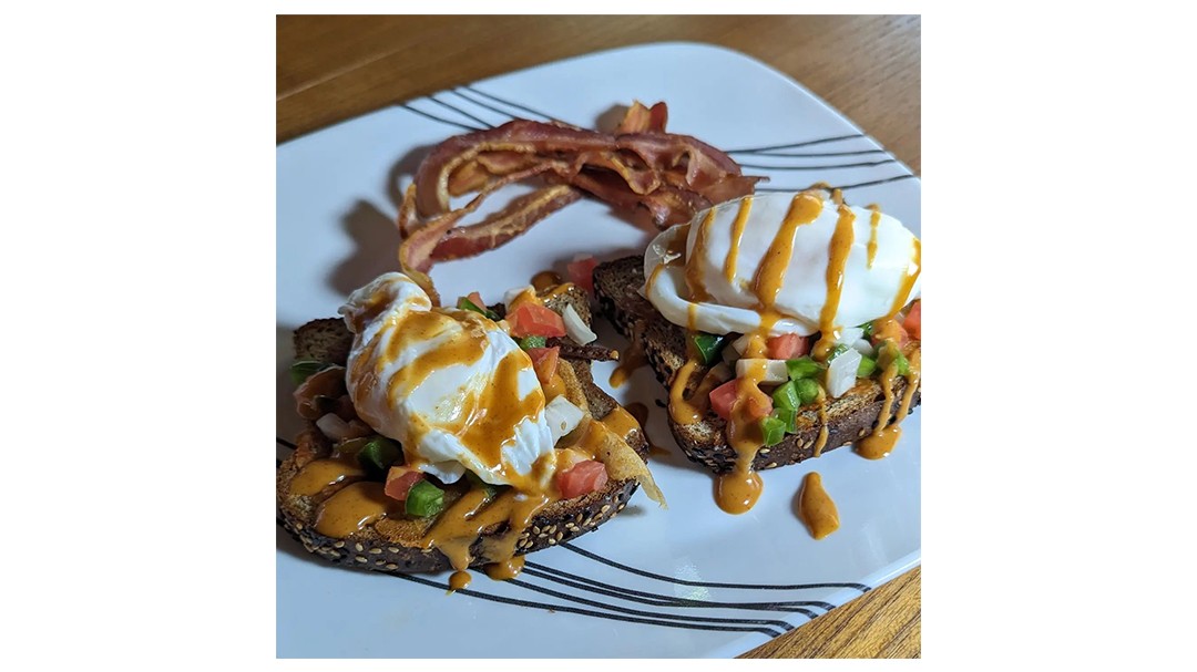 Image of Poached Eggs Over Toast with Spicy Chipotle